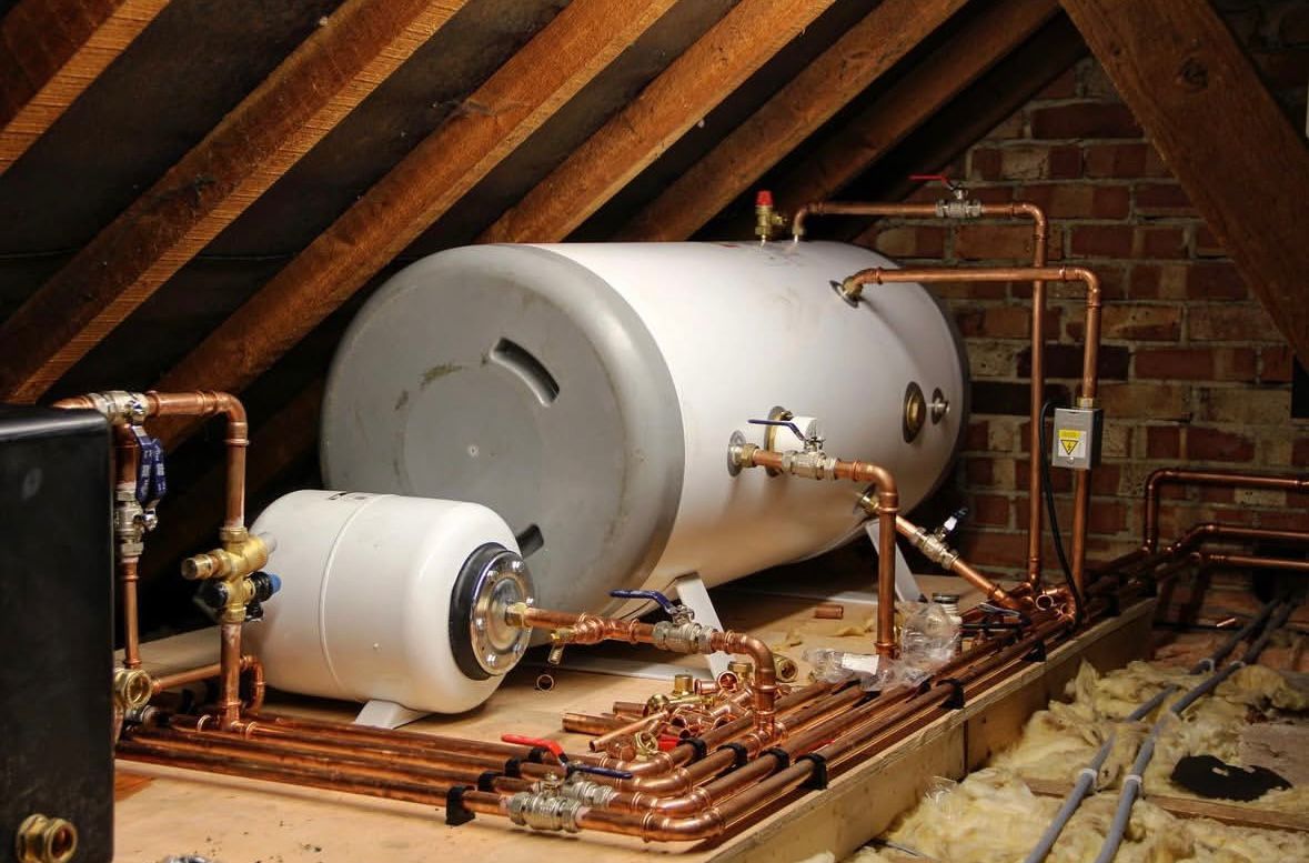 Unvented hot water cylinder installation in a loft